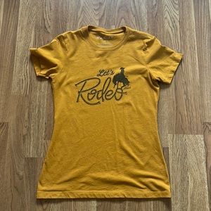 Small Ariat Let’s Rodeo mustard color Tshirt